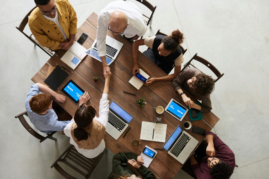 people working on a desk